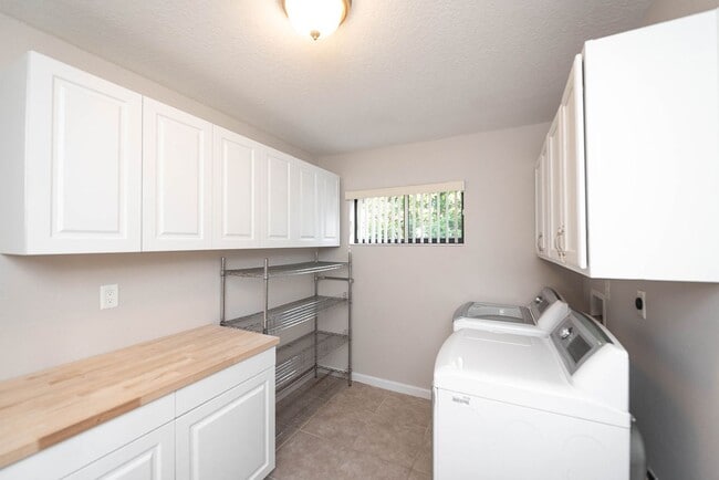 Photo - Welcome to this spacious three-bedroom, three-bath home in the heart of Palm Bay