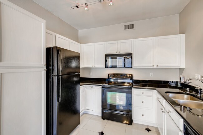 Photo - 5447 South Dover Street Unit 103