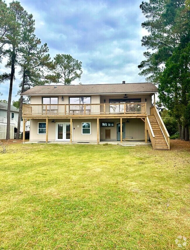 Building Photo - Waterfront Stunner! 3 BR/2.5BA + Private B... Rental