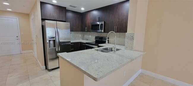 Building Photo - 10 Aragon Ave Unit 901