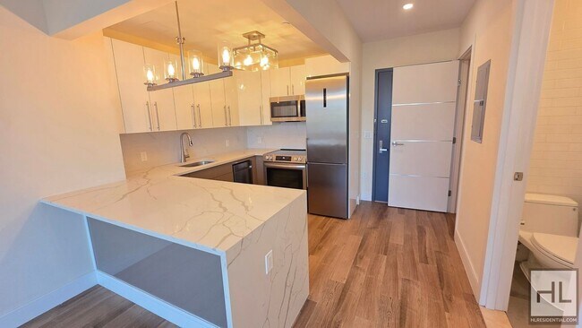 Sunlit 5th-Floor 1-Bed with a Showpiece Open Kitchen