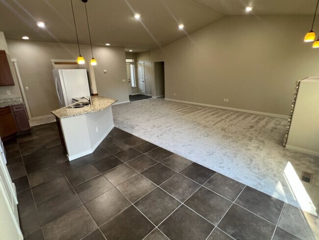 Photo - Beautiful 4 bed/2 bath home in excellent location, with a 3 car garage!