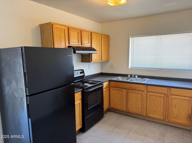 Building Photo - 1224 E Apache St Rental