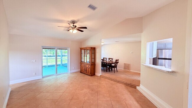 Photo - Bright & Spacious 3/2 Home with Huge Yard + Screened Patio — Lawn Care Included!