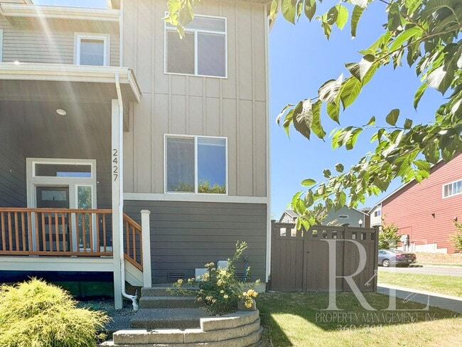 Photo - Modern End-Unit Townhome with Private Fenced Yard, Gourmet Kitchen & Spacious Layout