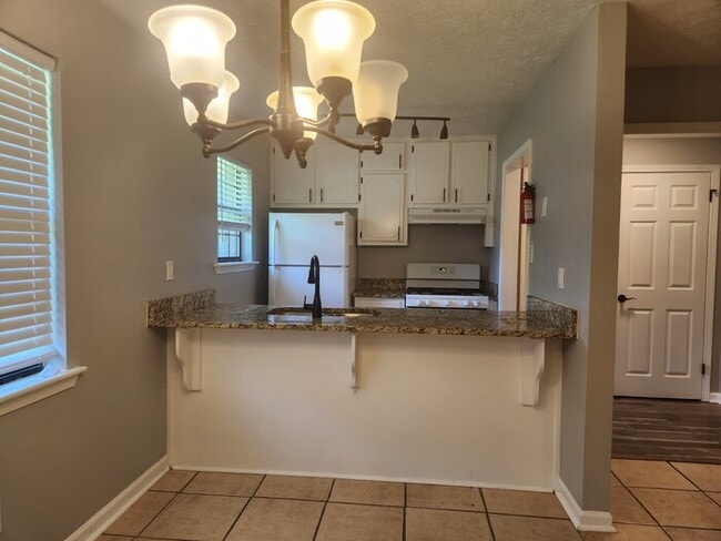 Building Photo - Make this home your sweet space! Unit 80