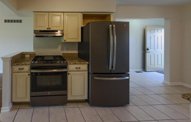 Photo - Move-In Ready Ranch Condo with Basement & Prime Location