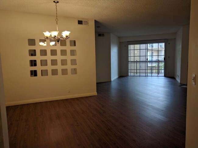 Dining place and living room - 10021 Tabor St Condo Unit #206