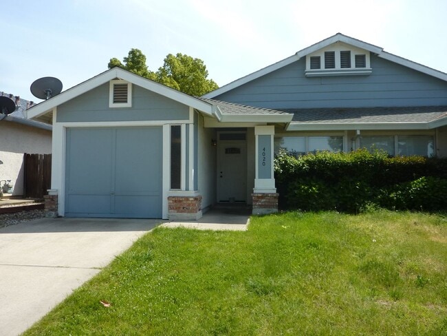 Building Photo - Duplex Unit w/ Attached Garage, Fenced Yard - Laminate Flooring