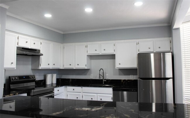 Photo - 108 World of Tennis Sq Unit 108C