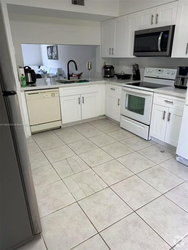 Building Photo - 14931 SW 82nd Terrace Unit 4-205 Rental