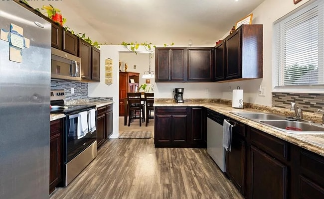 Photo - Spacious 5-Bedroom Home with Bonus Entertainment Room & Low-Maintenance Yard