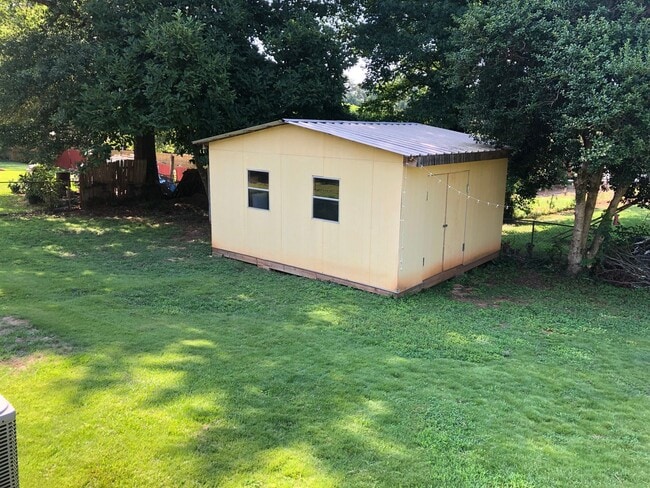 Photo - 3BR/2BA Home with Huge Fenced Yard, Fire pit Area & Storage Shop