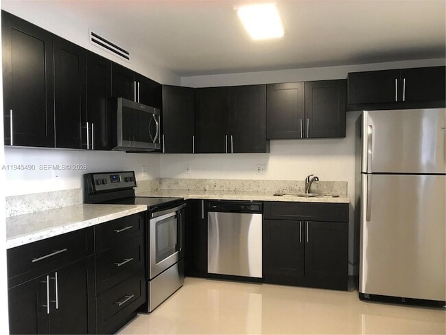 Building Photo - 14170 SW 84th St Unit 109-F