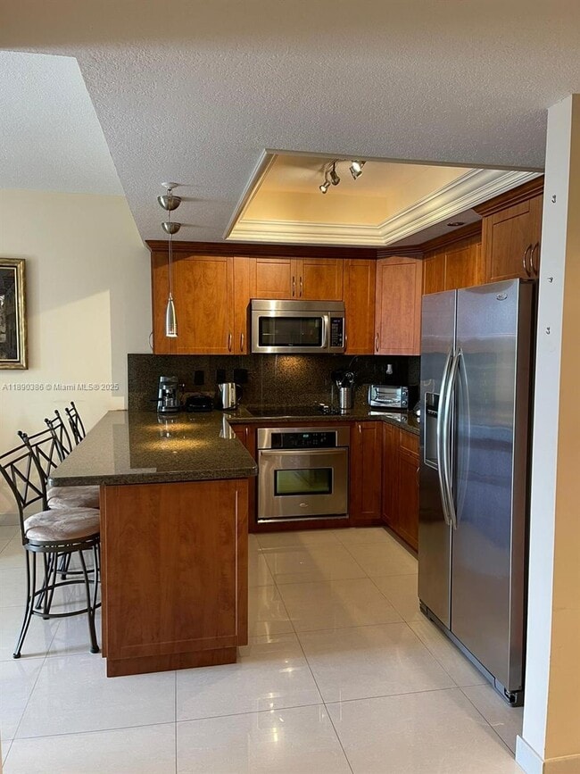 Building Photo - 3500 Coral Wy Unit 1403