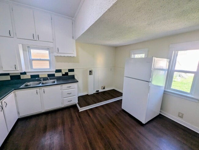 Photo - Remodeled 2-Bedroom Home with Main Floor Laundry & Off-Street Parking