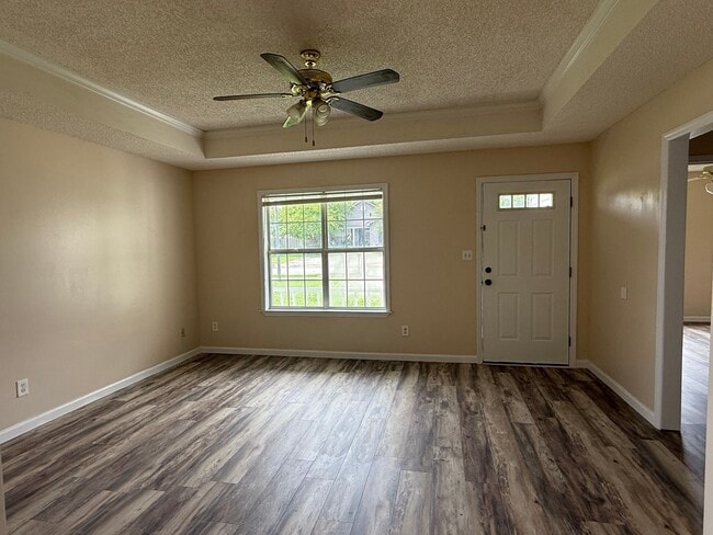 Photo - 3BR/2BA Single-Family Home with Versatile Bonus Room & No Carpet!