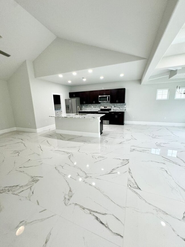 Photo - LOOK AT THIS ONE! BEAUTIFUL home with a pond view right outside the back patio!