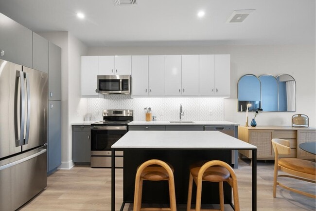 Building Photo - The District at 15Fifteen Rental
