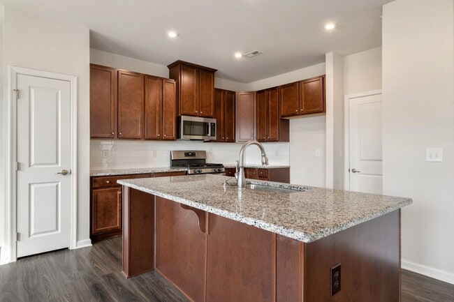 Photo - Application Pending! Welcome to this stunning 3-bed, 3-bath home located in the vibrant community...