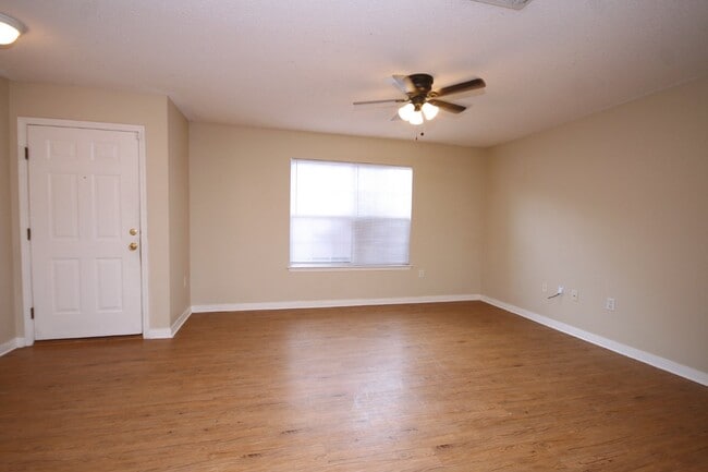 Photo - 3BR/2BA Home Near UWF – Wood-Look Flooring, Galley Kitchen, Pet Friendly!
