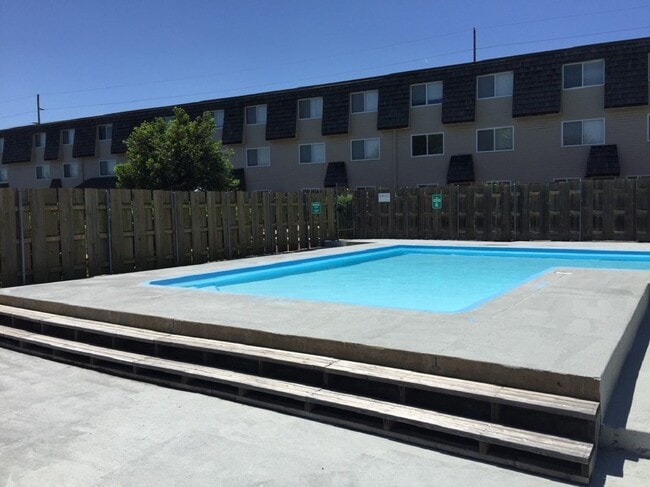 Enjoy a relaxing day by the pool at Cedar Ridge Apartments.