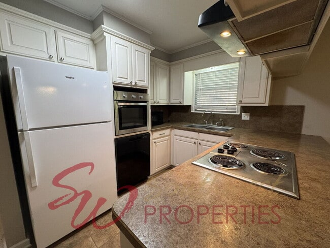 Photo - 3 bedroom  1 1/2 baths featuring large bedrooms and fenced yard!