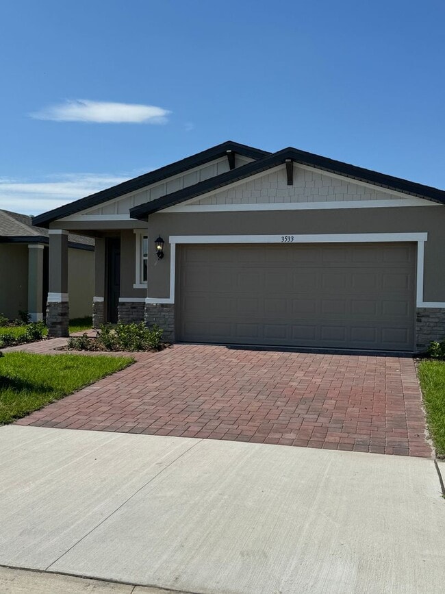 Photo - 3 Bedroom 2 Bath with Double Car Garage in Poinciana!