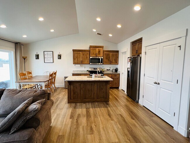 Photo - 5 Bed 3 Bath townhome with a 2 car garage ...
