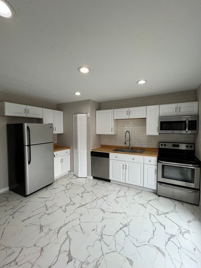 Photo - Spacious 3-Bedroom Ranch with 2-Car Garage & Oversized Fenced Backyard