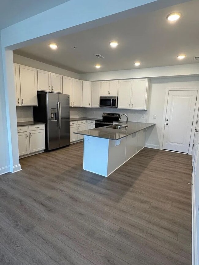 Photo - Stunning New Construction 3BD, 2.5BA Cary Townhome-Style Condo with a 1-Car Garage in a Prime Loc...