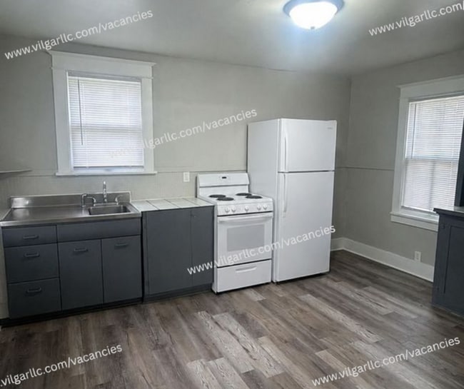 Photo - Step into comfort, convenience, and quality living in this conveniently designed 4-bedroom, 2-flo...