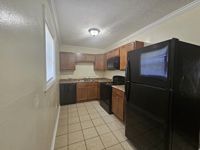 Photo - "Charming 3-Bedroom Retreat with Spacious Living"
