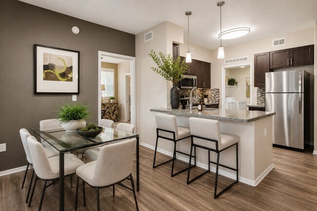 Step into modern elegance at Highland Groves at Morrison Ranch. This beautifully designed kitchen and dining area offer both style and functionality, ideal for your daily living. Explore your future home today!