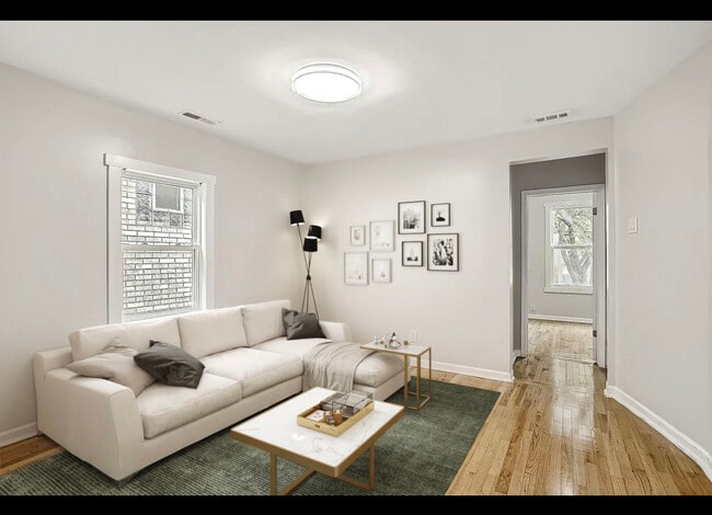 Building Photo - 5858 W Dakin St Unit 2