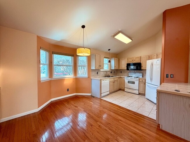 Photo - 5-Bed, 2.5-Bath Home Near MacIntosh Lake with Hardwood Floors, Gas Fireplace, and Finished Basement