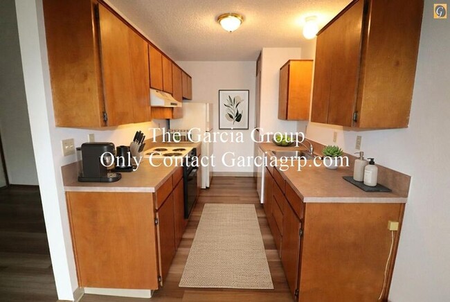 Building Photo - 3712 S Kelly Ave Unit # 5