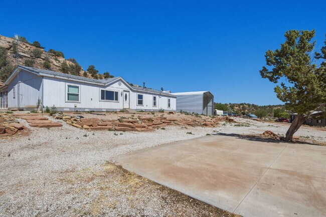 Rare 1.61 Acre Horse Property with Arena, Corrals, Shop & RV Parking