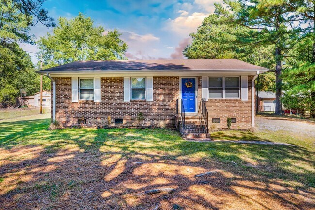 Photo - Charming 3-bed/2 bath home with large yard, screened deck located minutes from Brier Creek!