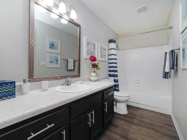Experience luxury in this modern bathroom, featuring sophisticated design and exquisite finishes.