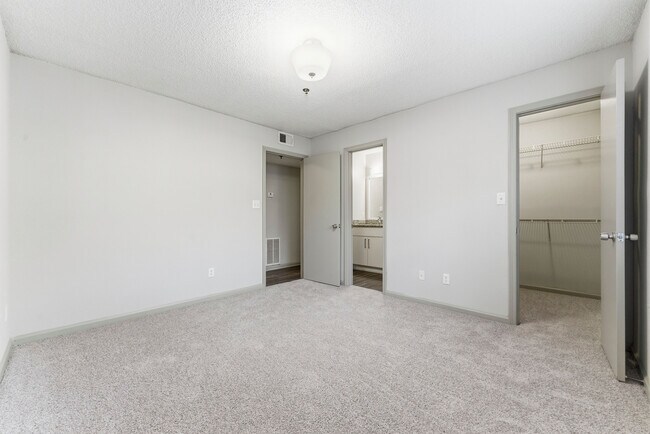 Relax in a serene bedroom retreat with ample space