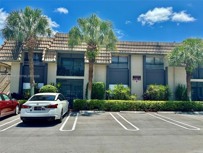Building Photo - 10722 Royal Palm Blvd Unit 8-2