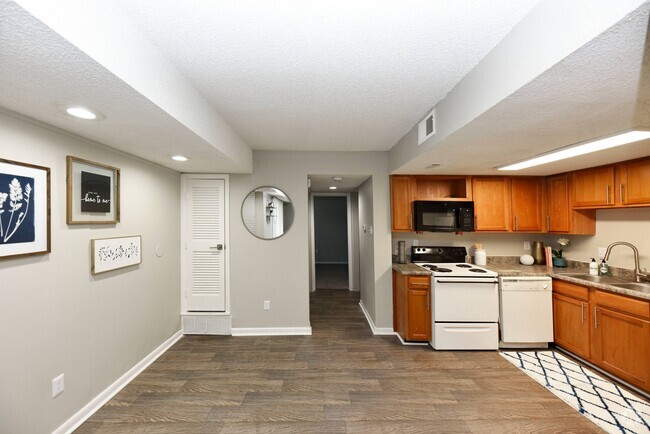 Kitchen + Hardwood Style Flooring - Tanglewood Rental