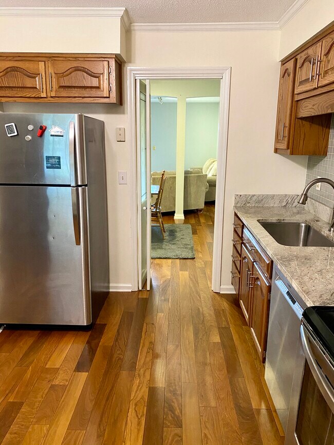 French sliding door leads from kitchen to dining and living rooms - 816 Oak St
