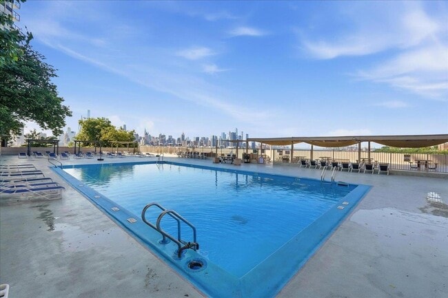 Building Photo - 6040 JFK Blvd E Unit 21J