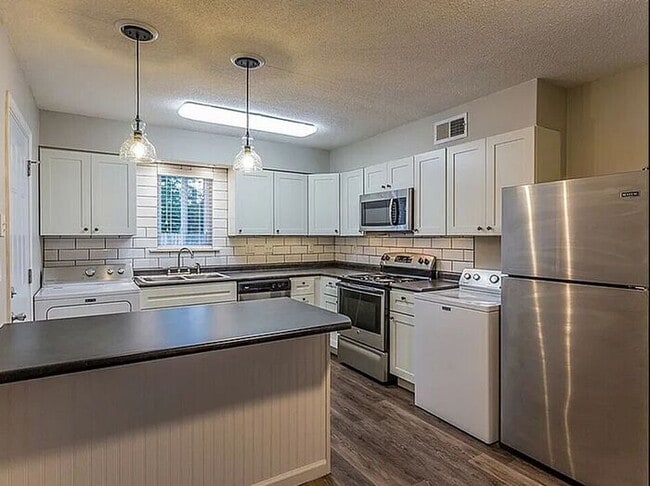 Building Photo - Warm Up This Winter at The Residence