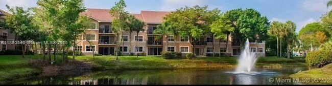 Photo - 8955 Wiles Rd Condo Unit 201