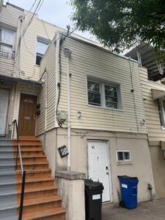 Building Photo - 943 E 213th St Unit 1