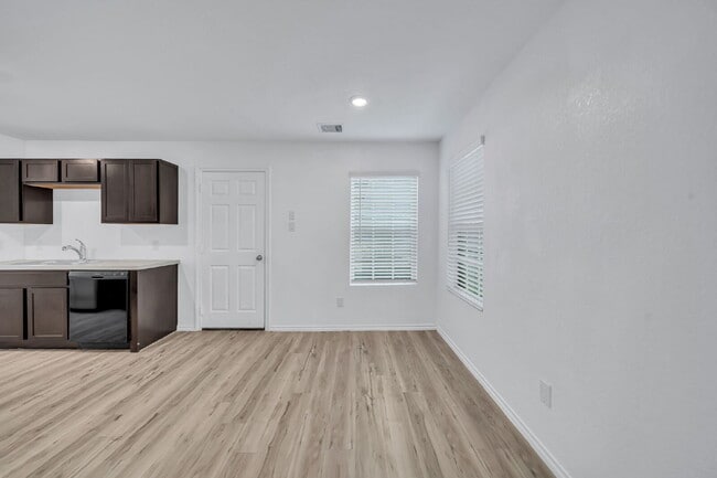 Photo - Like-new three bedroom single story home featuring a spacious open floor plan ideal for modern li...