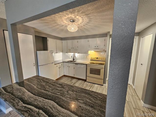 Building Photo - 1302 S Parker Rd Unit 128